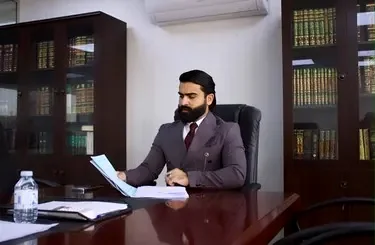 Lawyer Omar Al Omar at work